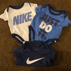 Nike baby onesies